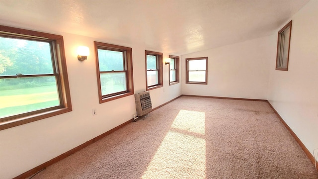 9470 Arbela Rd, Millington, MI 48746 - spare room with heating unit and light carpet