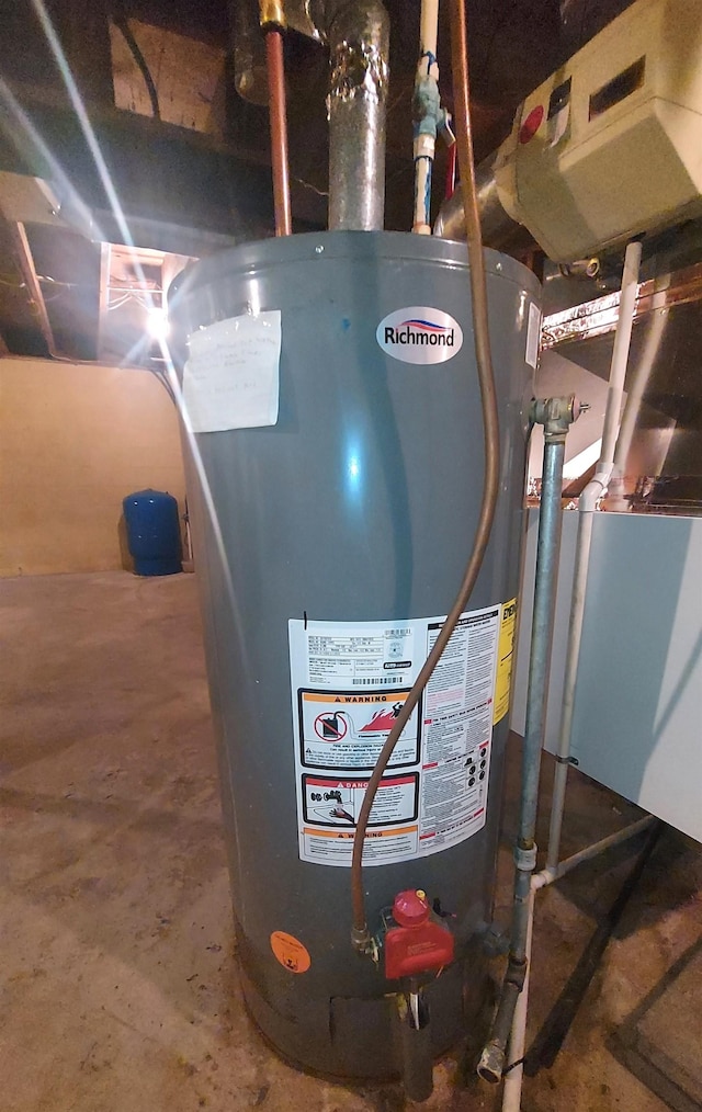 9470 Arbela Rd, Millington, MI 48746 - utility room featuring gas water heater