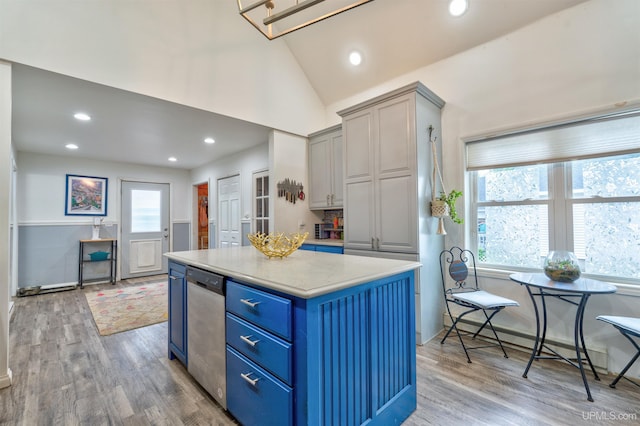 15951 Water St, Garden, MI 49835 - kitchen featuring blue cabinetry, plenty of natural light, light countertops, recessed lighting, and light wood finished floors