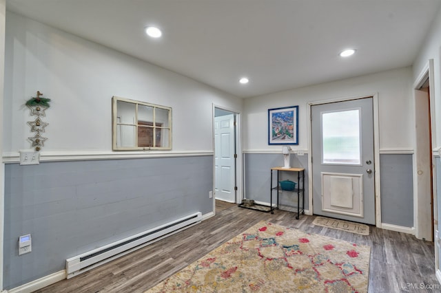 15951 Water St, Garden, MI 49835 - foyer entrance featuring a baseboard radiator, wood finished floors, and recessed lighting