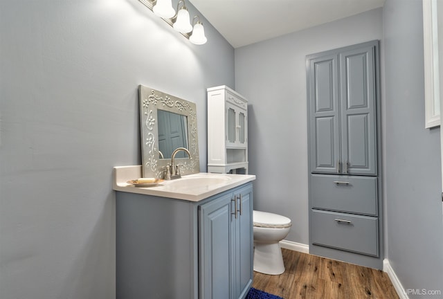 15951 Water St, Garden, MI 49835 - bathroom featuring vanity and wood finished floors