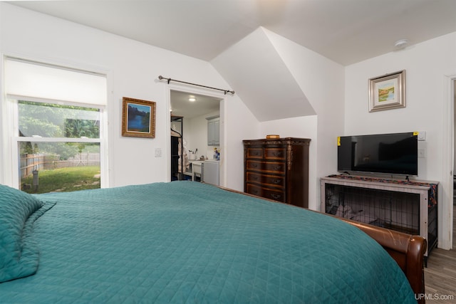 15951 Water St, Garden, MI 49835 - bedroom with wood finished floors and lofted ceiling