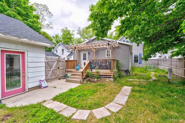 15951 Water St, Garden, MI 49835 - rear view of house with a wooden deck, a pergola, and a patio area