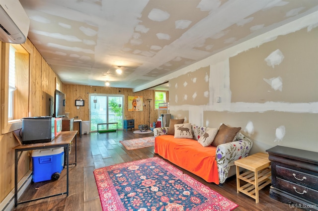 15951 Water St, Garden, MI 49835 - living room featuring wood walls, dark wood-type flooring, and a wall unit AC