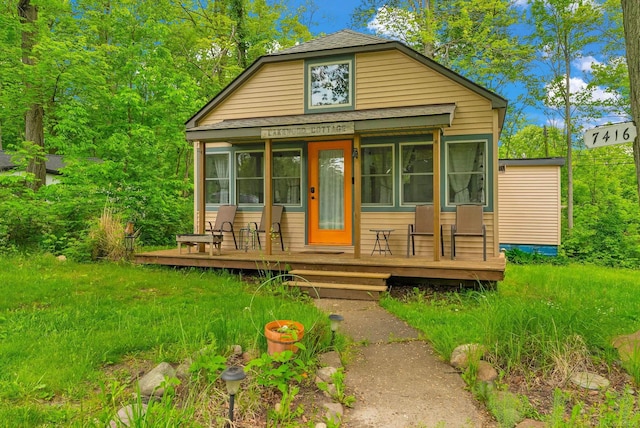 7416 Forest Rd, Lexington, MI 48450 - view of front facade featuring roof with shingles