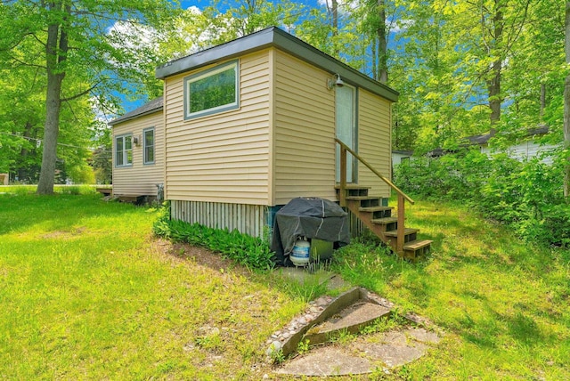 7416 Forest Rd, Lexington, MI 48450 - view of side of home with entry steps