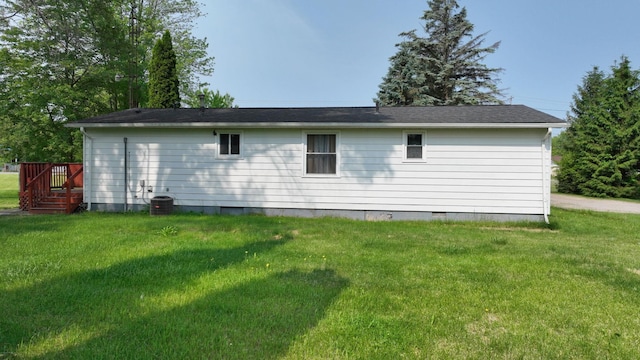 13148 Saginaw Rd, Clio, MI 48420 - back of house with crawl space, a yard, and a deck