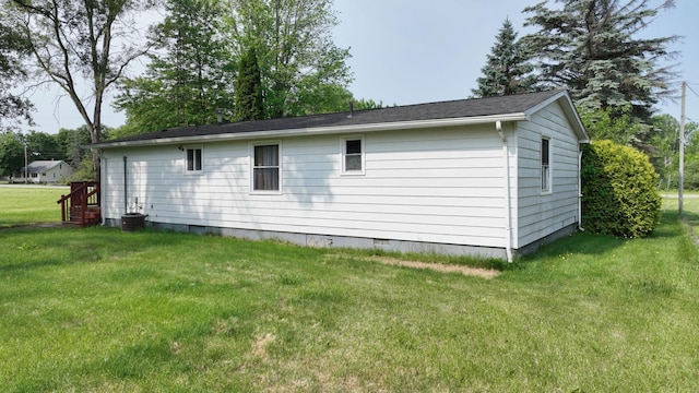 13148 Saginaw Rd, Clio, MI 48420 - view of property exterior featuring crawl space and a lawn