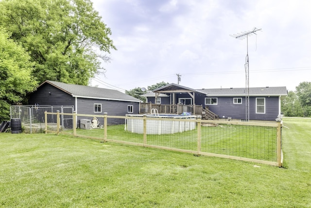 4856 Wagner Rd, Croswell, MI 48422 - rear view of house featuring a wooden deck