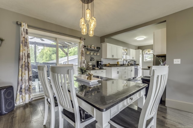 4856 Wagner Rd, Croswell, MI 48422 - dining room featuring dark wood-type flooring and a chandelier