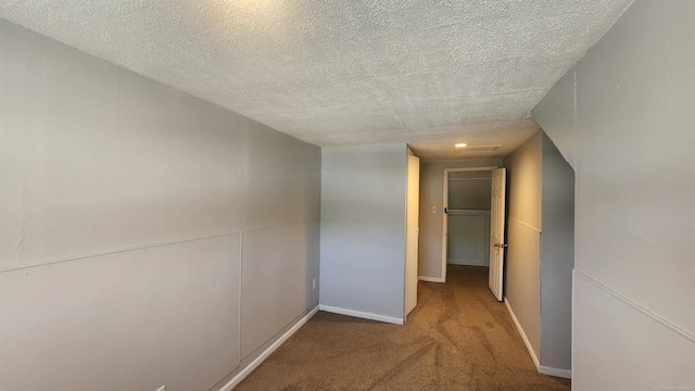 11444 Cadillac St, Warren, MI 48089 - corridor with a textured ceiling and carpet flooring