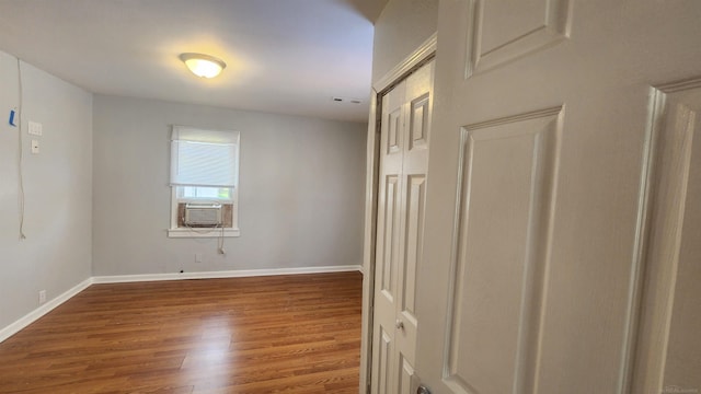11444 Cadillac St, Warren, MI 48089 - spare room featuring wood finished floors and cooling unit