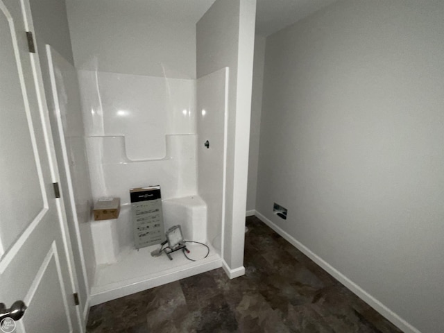 8540 Wildcat Rd, Jeddo, MI 48032 - bathroom featuring a shower and baseboards