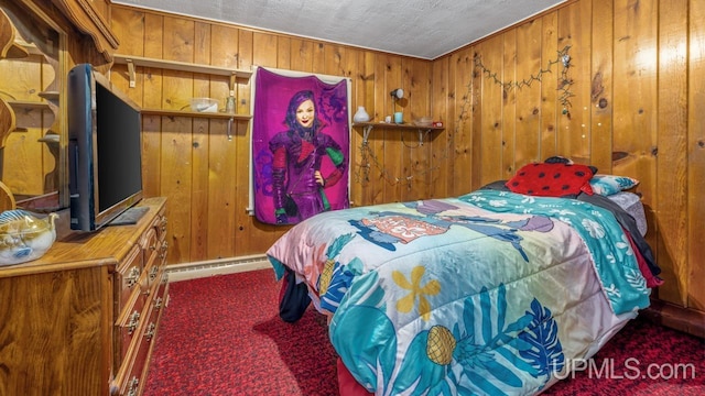 939 N 20th St, Escanaba, MI 49829 - carpeted bedroom featuring wood walls and baseboard heating