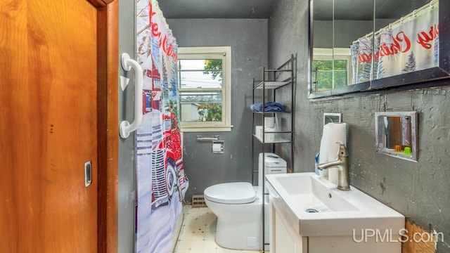 939 N 20th St, Escanaba, MI 49829 - full bath with vanity and tile patterned floors