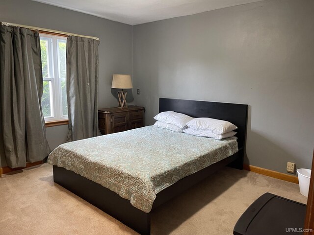 301 N 7th Ave, Hurley, WI 54534 - bedroom with carpet flooring and baseboards