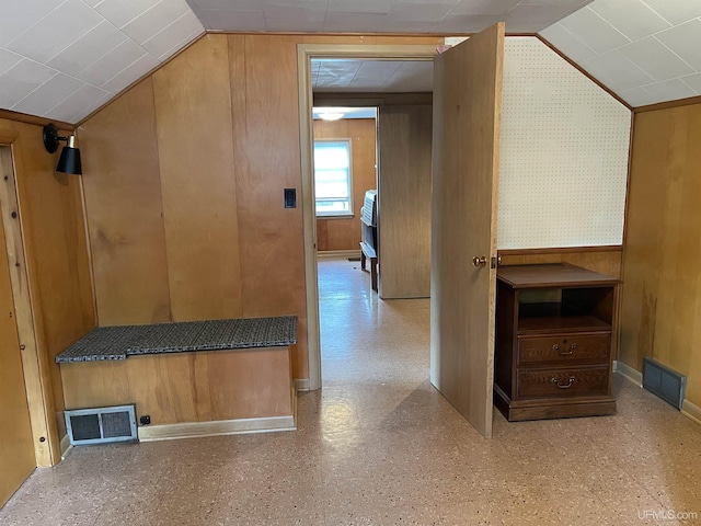 301 N 7th Ave, Hurley, WI 54534 - additional living space featuring vaulted ceiling, wallpapered walls, and wood walls