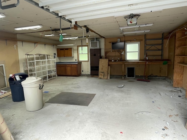 1549 N 7 Mile Rd, Sanford, MI 48657 - garage featuring a garage door opener