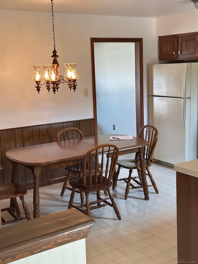 8856 Balboa Ave, Sterling Heights, MI 48313 - dining space with a chandelier and light floors