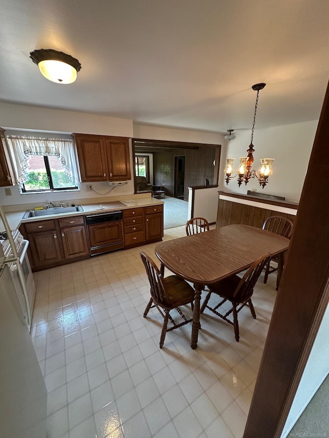 8856 Balboa Ave, Sterling Heights, MI 48313 - kitchen featuring a chandelier, dishwasher, light countertops, and hanging light fixtures