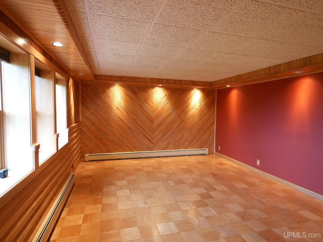 1120 Dextrom Rd, Calumet, MI 49913 - unfurnished room with a baseboard radiator and wooden walls