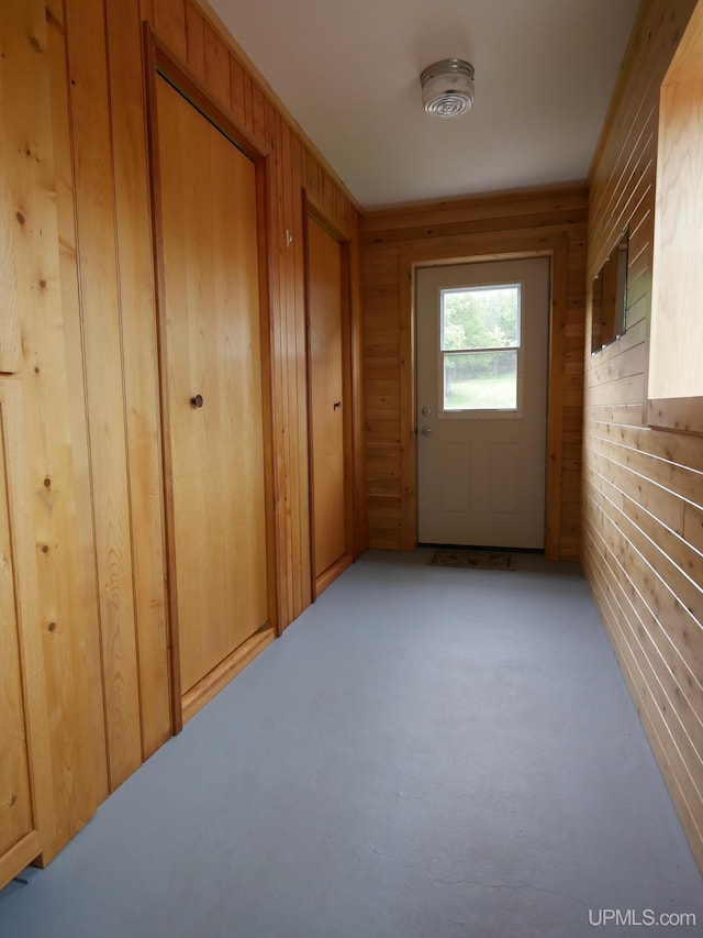 1120 Dextrom Rd, Calumet, MI 49913 - hallway featuring carpet and wooden walls