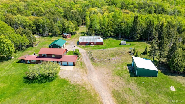 1120 Dextrom Rd, Calumet, MI 49913 - aerial view of property and surrounding area featuring a forest