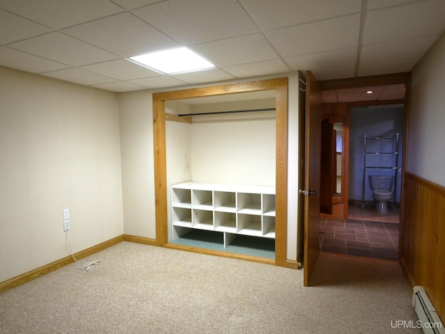 1120 Dextrom Rd, Calumet, MI 49913 - unfurnished bedroom featuring baseboard heating, carpet, and a drop ceiling