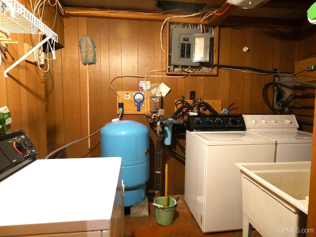 1120 Dextrom Rd, Calumet, MI 49913 - washroom with electric panel, independent washer and dryer, and wooden walls