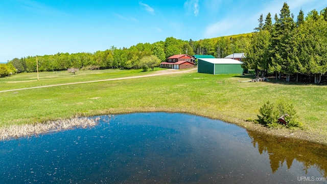 1120 Dextrom Rd, Calumet, MI 49913 - view from above of property with a nearby body of water and a heavily wooded area