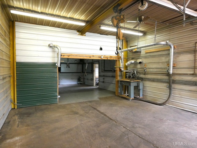 1120 Dextrom Rd, Calumet, MI 49913 - garage featuring wood walls