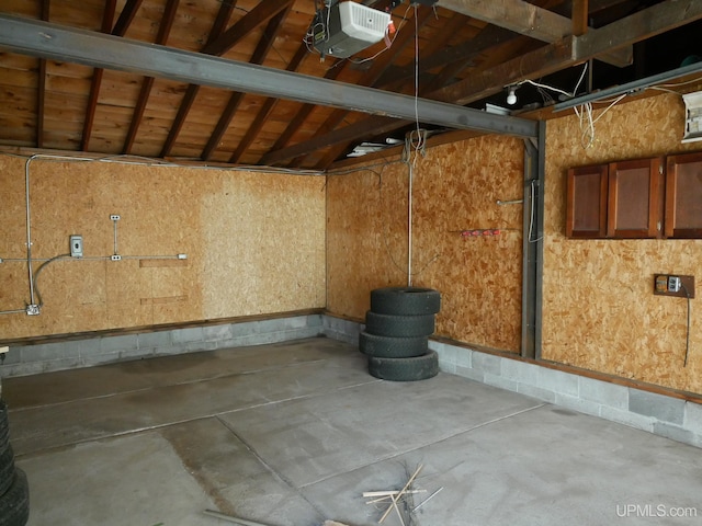 1120 Dextrom Rd, Calumet, MI 49913 - garage featuring a garage door opener