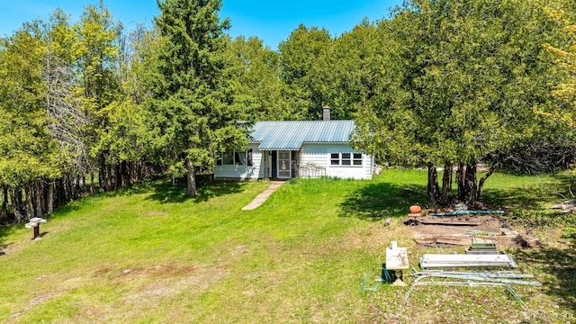 1120 Dextrom Rd, Calumet, MI 49913 - view of grassy yard with a view of trees