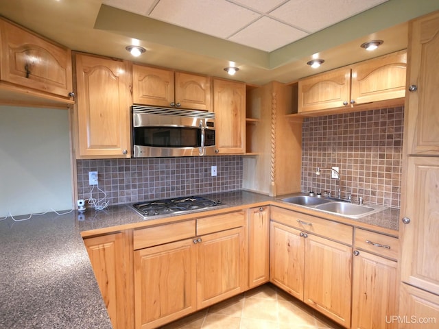 1120 Dextrom Rd, Calumet, MI 49913 - kitchen with appliances with stainless steel finishes, light brown cabinetry, and decorative backsplash