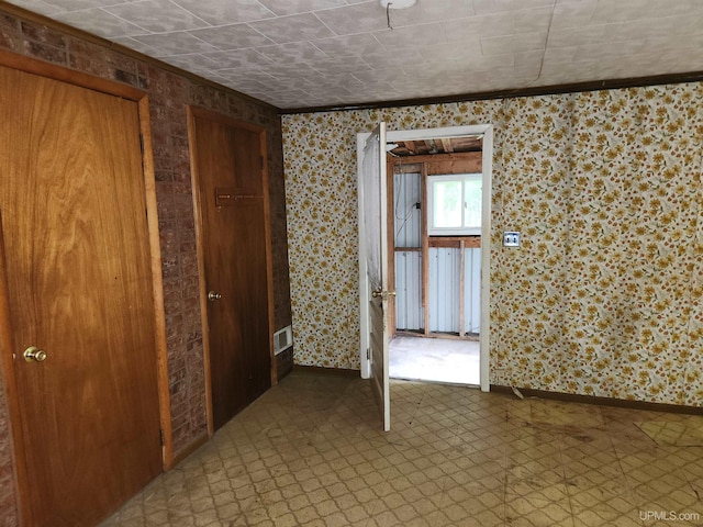 1120 Dextrom Rd, Calumet, MI 49913 - unfurnished room featuring crown molding