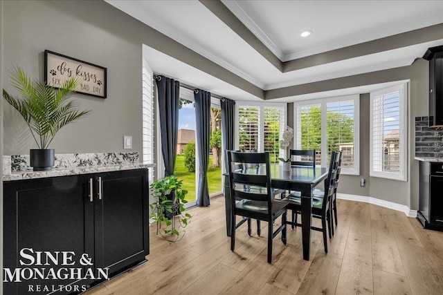 1319 S River Pointe Dr, Saint Clair, MI 48079 - dining area with crown molding, light wood-style flooring, a raised ceiling, and recessed lighting