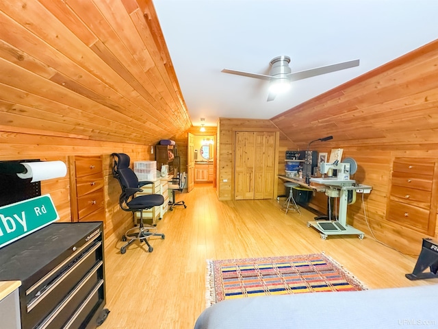 273 N Basin Dr, Negaunee, MI 49866 - office area featuring vaulted ceiling, wood finished floors, wooden walls, and ceiling fan