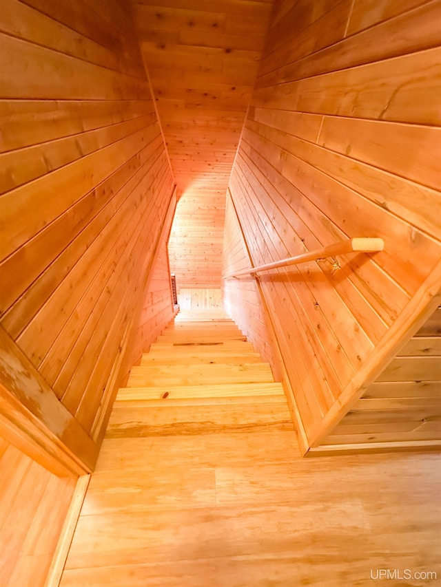 273 N Basin Dr, Negaunee, MI 49866 - stairs featuring wood finished floors and wooden walls
