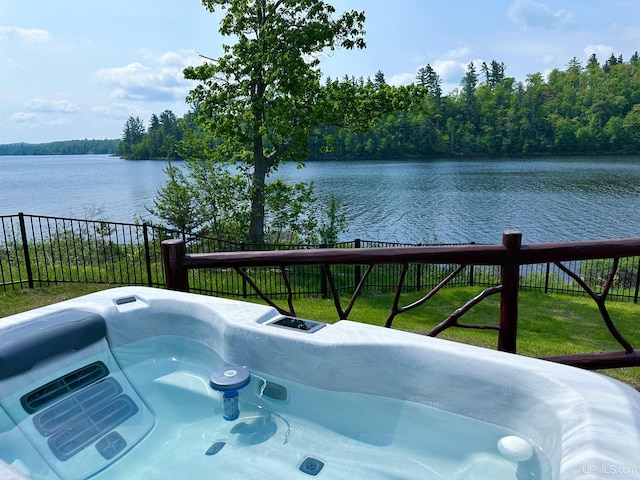 273 N Basin Dr, Negaunee, MI 49866 - water view featuring a fenced backyard