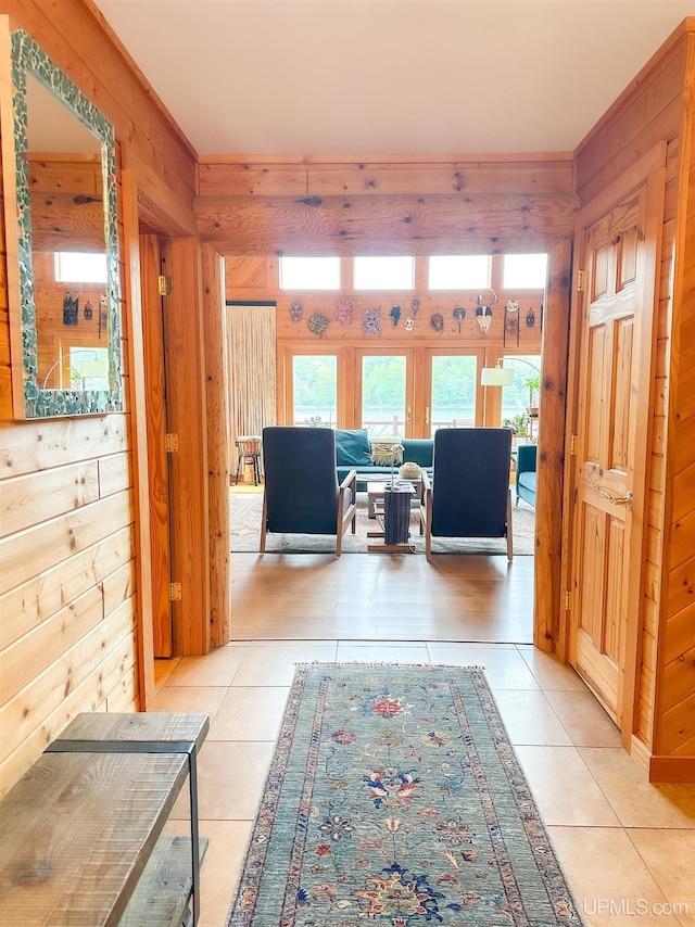 273 N Basin Dr, Negaunee, MI 49866 - corridor with wood walls and light tile patterned floors