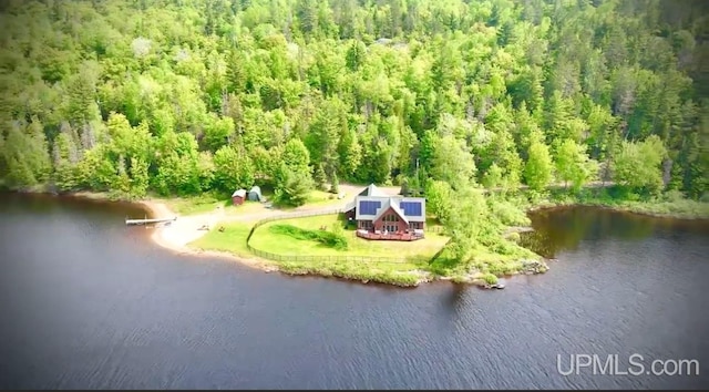 273 N Basin Dr, Negaunee, MI 49866 - view of subject property with a forest and a large body of water