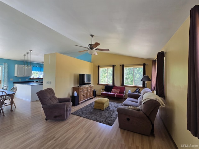 49962 Rosenlund Rd, Hancock, MI 49930 - living room with light wood-type flooring, healthy amount of natural light, a ceiling fan, and vaulted ceiling