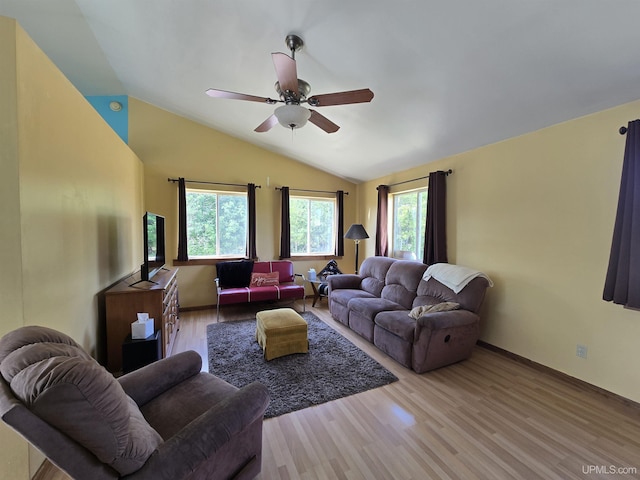 49962 Rosenlund Rd, Hancock, MI 49930 - living area featuring vaulted ceiling, wood finished floors, and ceiling fan