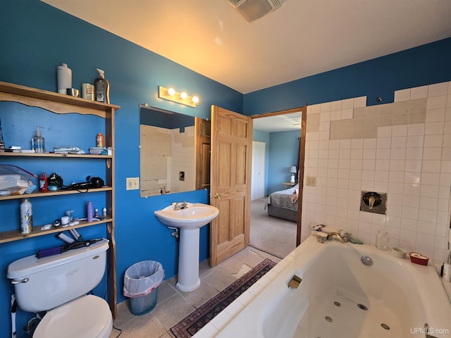 49962 Rosenlund Rd, Hancock, MI 49930 - ensuite bathroom featuring a whirlpool tub and tile patterned flooring