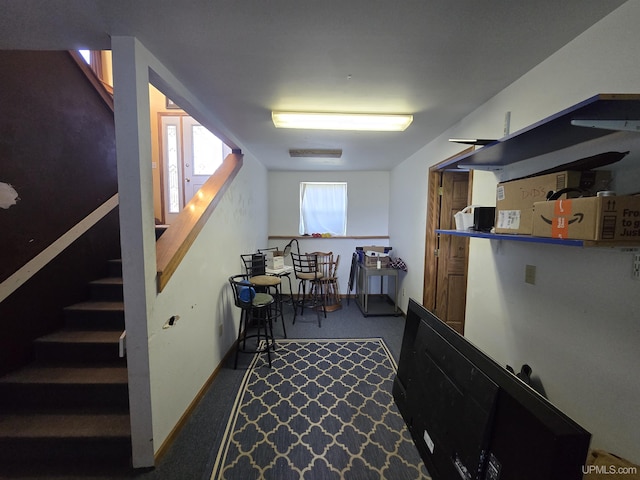 49962 Rosenlund Rd, Hancock, MI 49930 - basement featuring stairs and dark colored carpet
