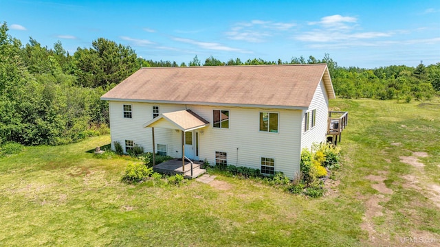 49962 Rosenlund Rd, Hancock, MI 49930 - back of property featuring a shingled roof, a deck, and a yard