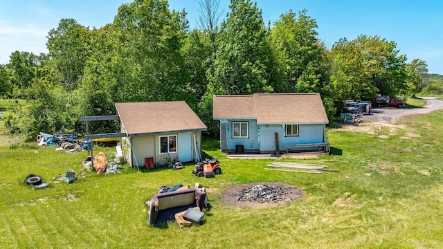 49962 Rosenlund Rd, Hancock, MI 49930 - rear view of house with an outbuilding and a yard