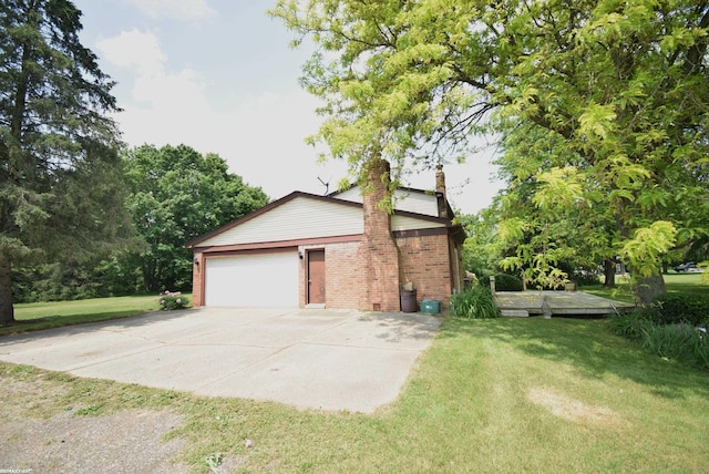 71800 Coon Creek Rd, Armada, MI 48005 - view of side of property with brick siding, a chimney, a lawn, an attached garage, and driveway