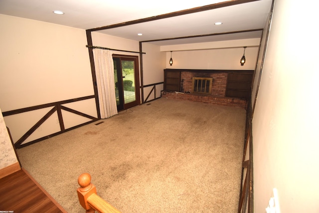 71800 Coon Creek Rd, Armada, MI 48005 - unfurnished living room featuring a brick fireplace, recessed lighting, and carpet flooring