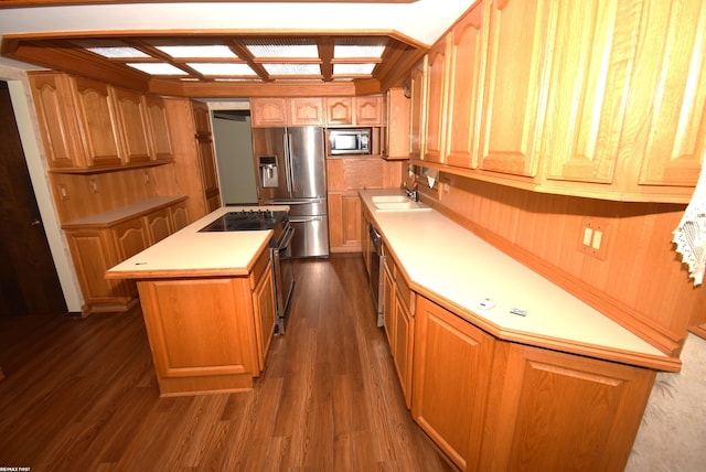 71800 Coon Creek Rd, Armada, MI 48005 - kitchen featuring stainless steel appliances, a kitchen island, light countertops, dark wood-style flooring, and coffered ceiling